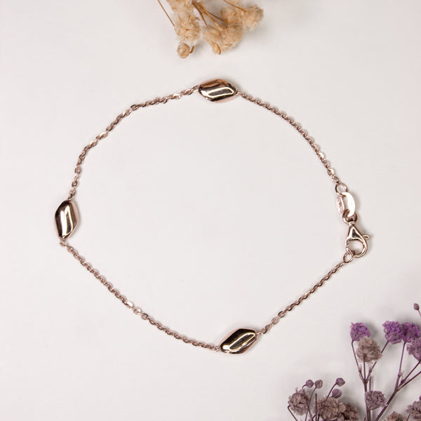 Minimalist Rose Gold Bracelet with Polished Bead Accents